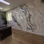 Finished marble-look feature wall and flooring renovation